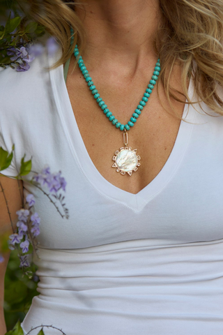 Mignonne Gavigan Semi Precious Odyssey Necklace in Blues featuring turquoise beads and a reversible compass charm.