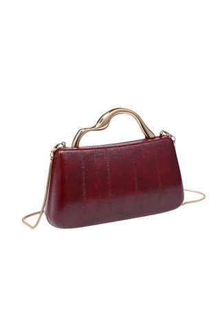 Rue Aveline Nichelle Clutch in Burgundy featuring textured vegan leather, a structured frame silhouette, gold-tone top handle, and removable chain strap.