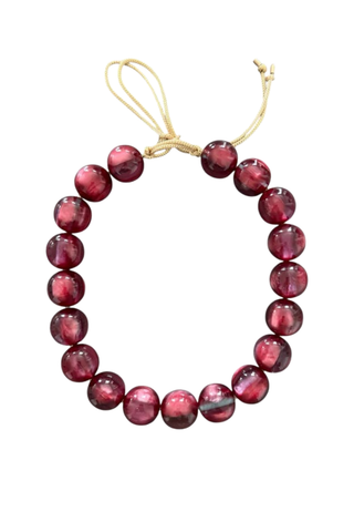 KMS Gems Chunky Beaded Necklace in Cranberry featuring oversized marbled cranberry and burgundy beads with an adjustable gold silk cord.