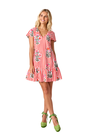 Model wearing Crosby Phoebe Dress in Garden Parasol featuring red stripe print, floral motifs, flutter sleeves, and a flounced mini silhouette