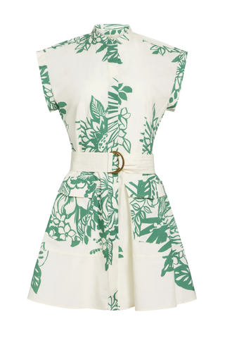 White dress with green leaf pattern and belt on a white background