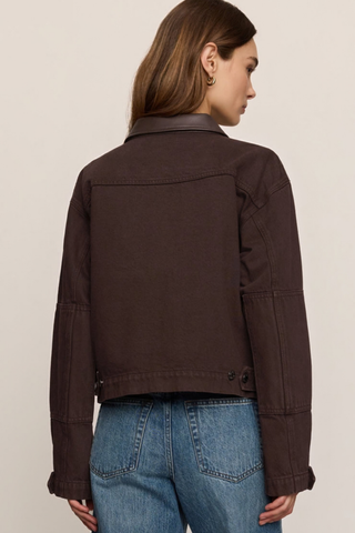 Z Supply Rey Cropped Chore Jacket in Umber featuring a brown cotton body, dark faux leather collar, button front, and utility pockets.