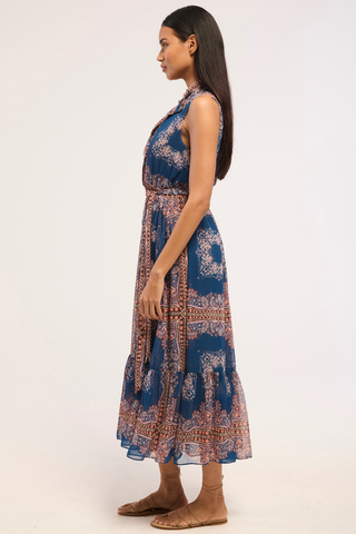 Blue printed chiffon midi dress with ruffle trim, button front, and tie waist.