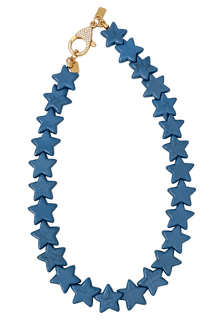 Smith & Co. Design Large Star Necklace in Dusty Blue featuring oversized muted blue star-shaped beads and a lobster clasp closure.