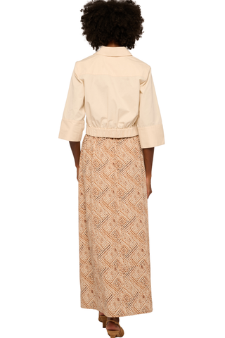 Love the Label Beckett Top in cream featuring a collared neckline, button front, cropped silhouette, and 3/4-length sleeves.