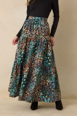 Prosperina Wintour Maxi Skirt in Urban Jungle featuring a full-length flowing silhouette with a rich multicolor botanical print.