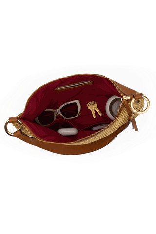 Hammitt Kyle Lrg Handbag in Cocoa Raffia featuring woven raffia, tan pebbled leather trim, gold hardware, and a large slouchy shoulder bag silhouette