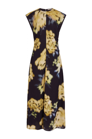 Marie Oliver Zuri Dress in Lush featuring oversized golden florals on a black background with a fluid sleeveless maxi silhouette.