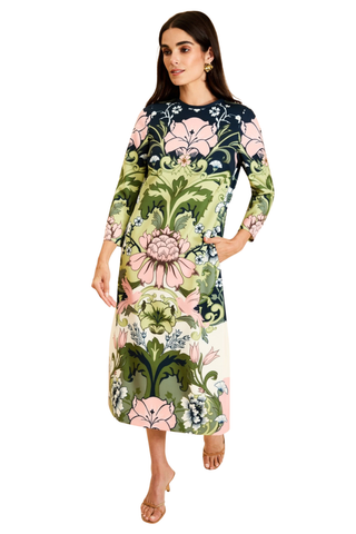 Mestiza Consuela Midi Dress in Eventide Gardens featuring a colorful botanical floral print, long sleeves, and a tailored midi silhouette.