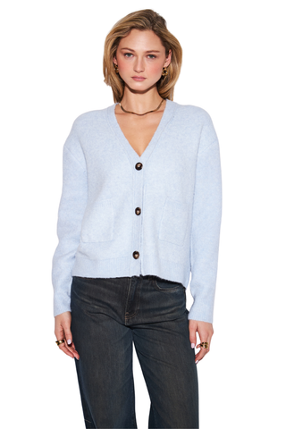 JOHN & JENN Braxton Sweater in Sky featuring a light blue knit, V-neckline, button front, and long sleeves.