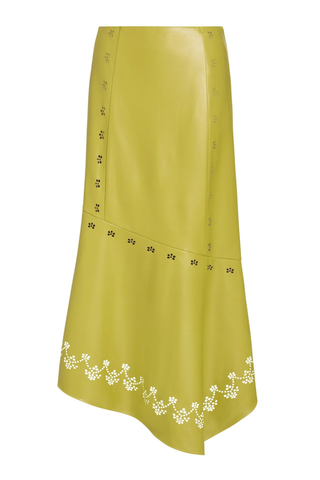 Marie Oliver Casey Skirt in Willow featuring vivid chartreuse vegan leather, laser-cut floral details, and an asymmetrical midi hem.