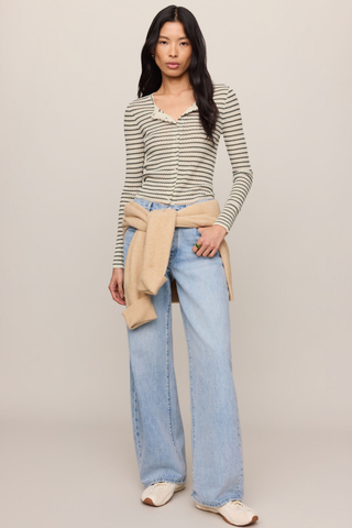 Z Supply Rosanna Stripe Sweater Top in Chalk featuring neutral horizontal stripes, long sleeves, an open neckline, and fitted silhouette.