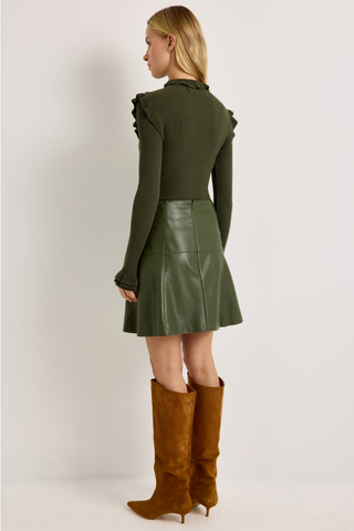 Tinley Turtleneck in Juniper Green featuring a fitted ribbed silhouette, long sleeves, and feminine ruffle trim at the neckline and shoulders.