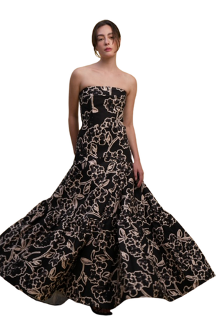 Strapless black printed formal gown with a structured bodice and full skirt.