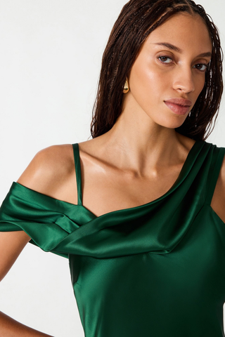 Steve Madden Analeia Dress in Winter Pine green featuring an asymmetrical off-the-shoulder neckline and floor-length fitted silhouette.