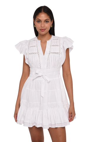 Love the Label Madelyn Mini Dress in bright white featuring flutter sleeves, lace inset details, a tie waist, and tiered ruffle hem