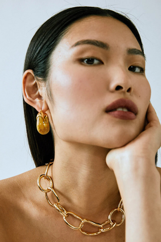 Lizzie Fortunato Organic Hoop earrings featuring gold-plated brass hoops with translucent resin accents