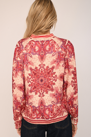 Love the Label Novalie Top in Hearts In Tandem Print featuring a red and pink heart-inspired print with long sleeves and feminine detailing.