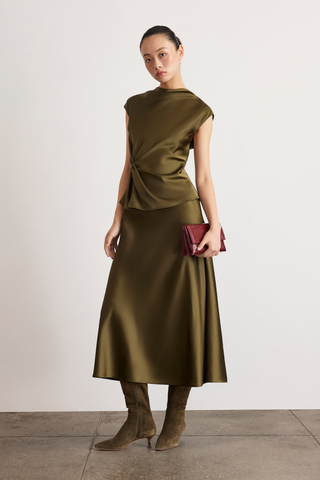 Tanya Taylor Beth Skirt in Fern olive green satin crepe with a flowing bias-cut A-line midi silhouette.