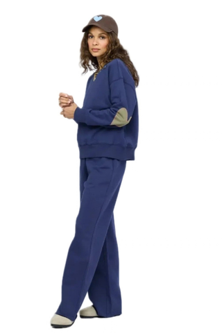 Kerri Rosenthal Ex-Boyfriend Sweatshirt in indigo blue featuring contrast heart elbow patches and a relaxed cotton fleece silhouette.