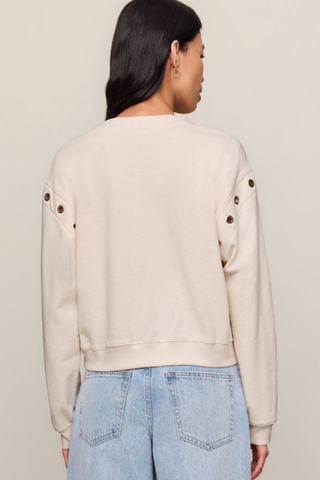 Z Supply Axel Grommet Sweatshirt in Sandstone featuring gold grommet detailing and soft French terry fabric.