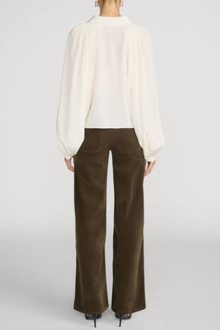 FRAME Le Slim Palazzo Corduroy pants in Rich Military olive featuring a high rise, front patch pockets, and full-length wide-leg silhouette.