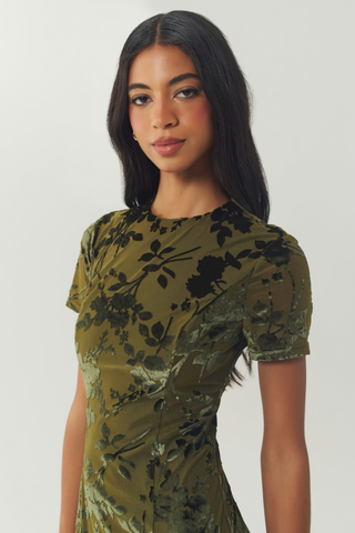 Hutch Rumy Dress in Olive featuring a fitted midi silhouette, short sleeves, an allover olive print, and side slit.