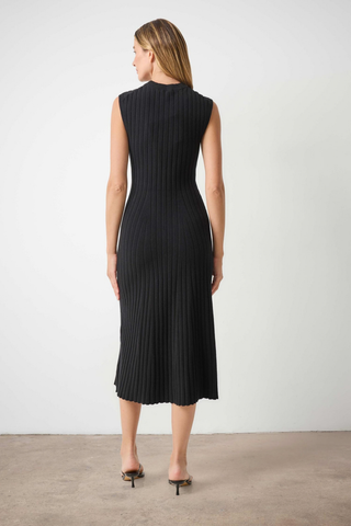 Woman wearing the Lilla P Midi Flare Dress in Black, a sleeveless ribbed knit midi dress with a flared hem.