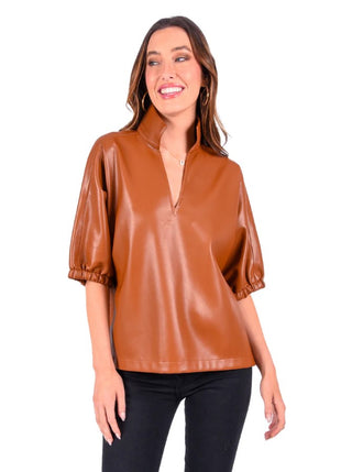 Emily McCarthy Poppy Top in Luggage Vegan Leather featuring a relaxed silhouette, stand collar, and short dolman sleeves.