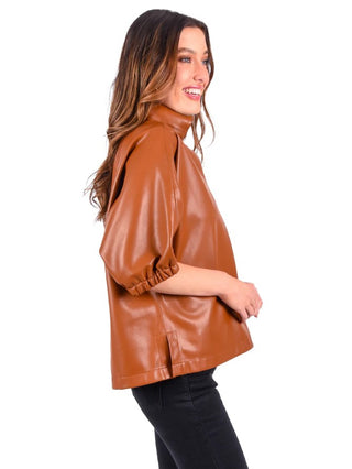 Emily McCarthy Poppy Top in Luggage Vegan Leather featuring a relaxed silhouette, stand collar, and short dolman sleeves.