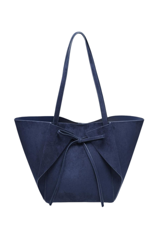 Urban Expressions Soren Tote in Midnight blue vegan suede with long shoulder straps, bow-front detail, and matching zip pouch.