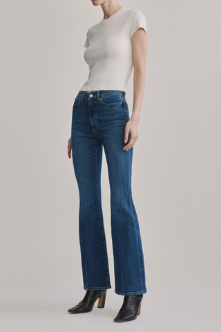 DL1961 Bridget Boot Jean in Night Diner featuring a high-rise bootcut fit, mid-blue wash, and subtle whisker detailing.