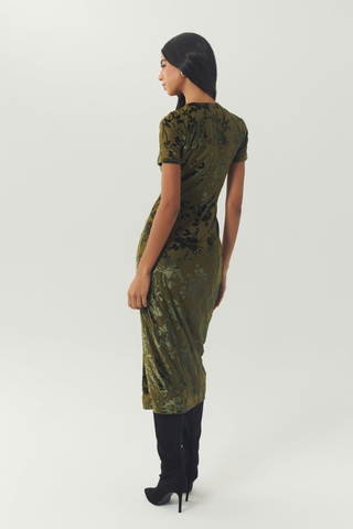Hutch Rumy Dress in Olive featuring a fitted midi silhouette, short sleeves, an allover olive print, and side slit.