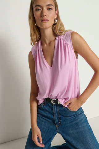 Model wearing the Nation LTD Selma V-Neck Tank in Lilac featuring a relaxed silhouette, flattering V-neckline, and lightweight slub Pima cotton knit.