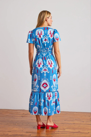 Sheridan French Eloise Dress in Americana Ikat featuring cobalt blue ikat print, ruched waist, flutter sleeves, midi silhouette, and side pockets