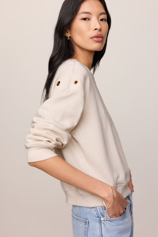 Z Supply Axel Grommet Sweatshirt in Sandstone featuring gold grommet detailing and soft French terry fabric.