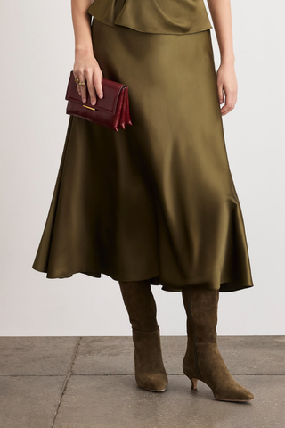 Tanya Taylor Beth Skirt in Fern olive green satin crepe with a flowing bias-cut A-line midi silhouette.