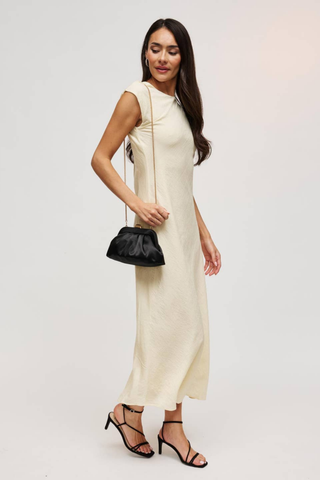 Urban Expressions Winter Clutch in Black with soft pleating, polished metal frame, kiss-lock clasp, and slender chain strap.