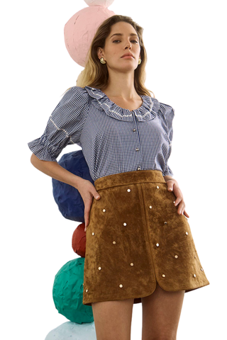 Hunter Bell Dottie Skirt in Saddle featuring a warm brown tonal motif, mini length, and front patch pockets.