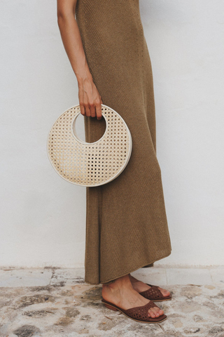 Bembien Anouk Bag in rattan circular woven handbag with cut-out handle and leather trim