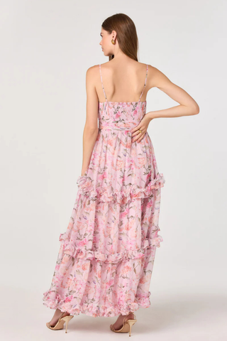 ASTR Ayanna Dress in pink floral print featuring a V-neckline, spaghetti straps, cinched waist, and tiered ruffle maxi skirt