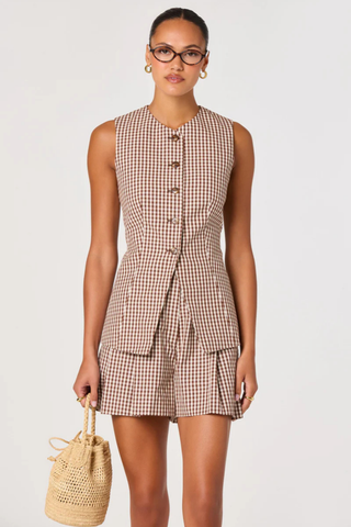 ASTR Preston Shorts in brown checker gingham print featuring a high-rise fit with front pleats and a tailored silhouette