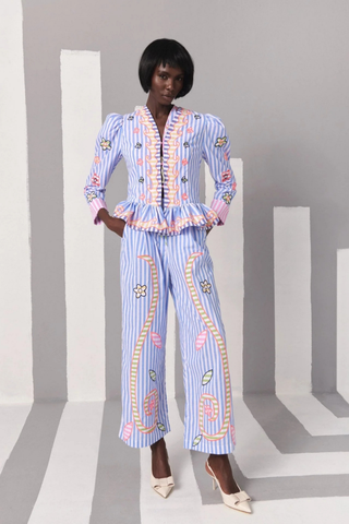 Celia B Avra Jacket in Multi featuring blue and white stripes, colorful embroidered floral details, puff sleeves, and ruffle hem styling