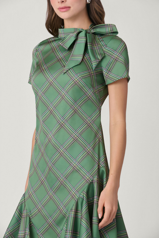 Shoshanna Bosher Dress in Olive Multi featuring a green printed mini silhouette, ruffled neckline, short sleeves, and flounced hem.