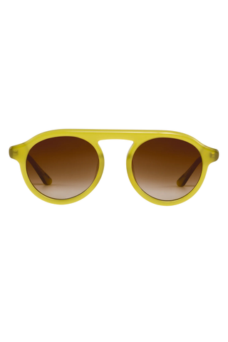 KREWE Cameron Sunglasses in Chartreuse featuring a rounded aviator silhouette, connected brow bar, translucent acetate frame, and brown gradient lenses