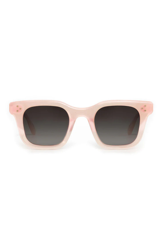 Pink sunglasses on a white background.