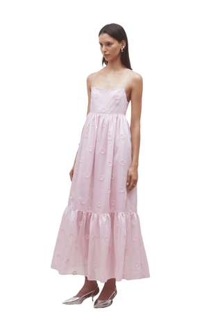 Pink tiered maxi dress with thin straps and embroidered floral detailing