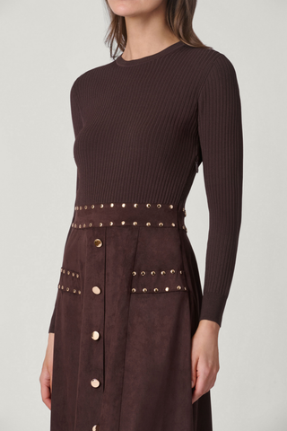 Shoshanna Cleo Dress in Chocolate with long-sleeve ribbed knit bodice, faux suede midi skirt, and gold stud and button detailing.