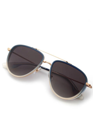 Krewe Coleman Sunglasses in Matte Indigo Fade featuring gold-plated aviator hardware, grey gradient lenses, and modern side shield detailing