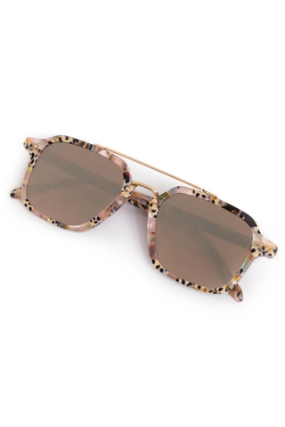 Krewe Colton Sunglasses in Pink Poppy featuring marbled acetate frames, mirrored amber gradient lenses, and gold-plated aviator detailing
